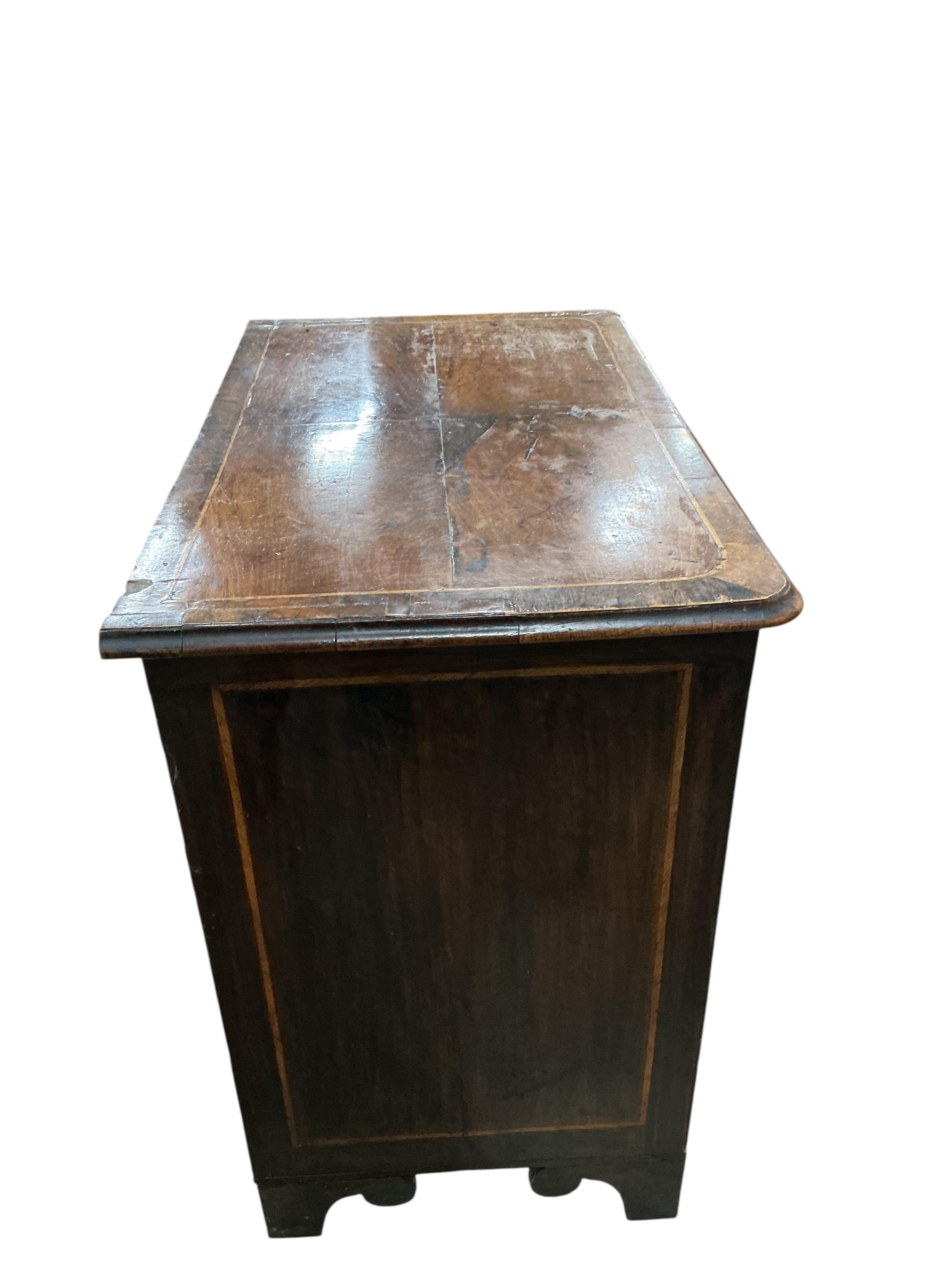 An 18th century walnut kneehole desk, width 79cm, depth 49cm, height 84cm